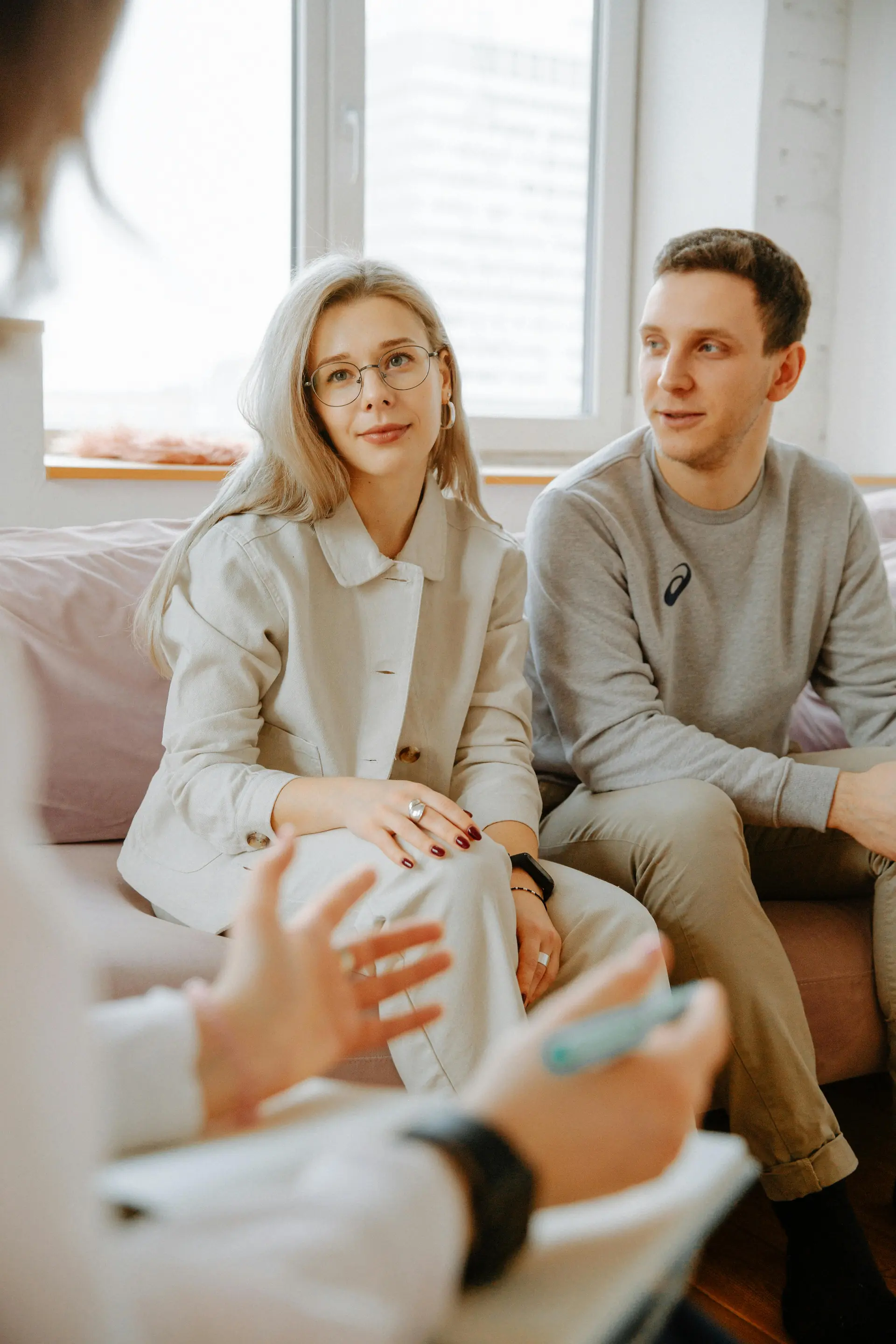 Care professional smiling with client